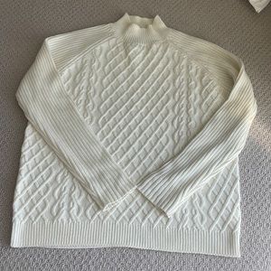 BCBG off white sweater in size medium